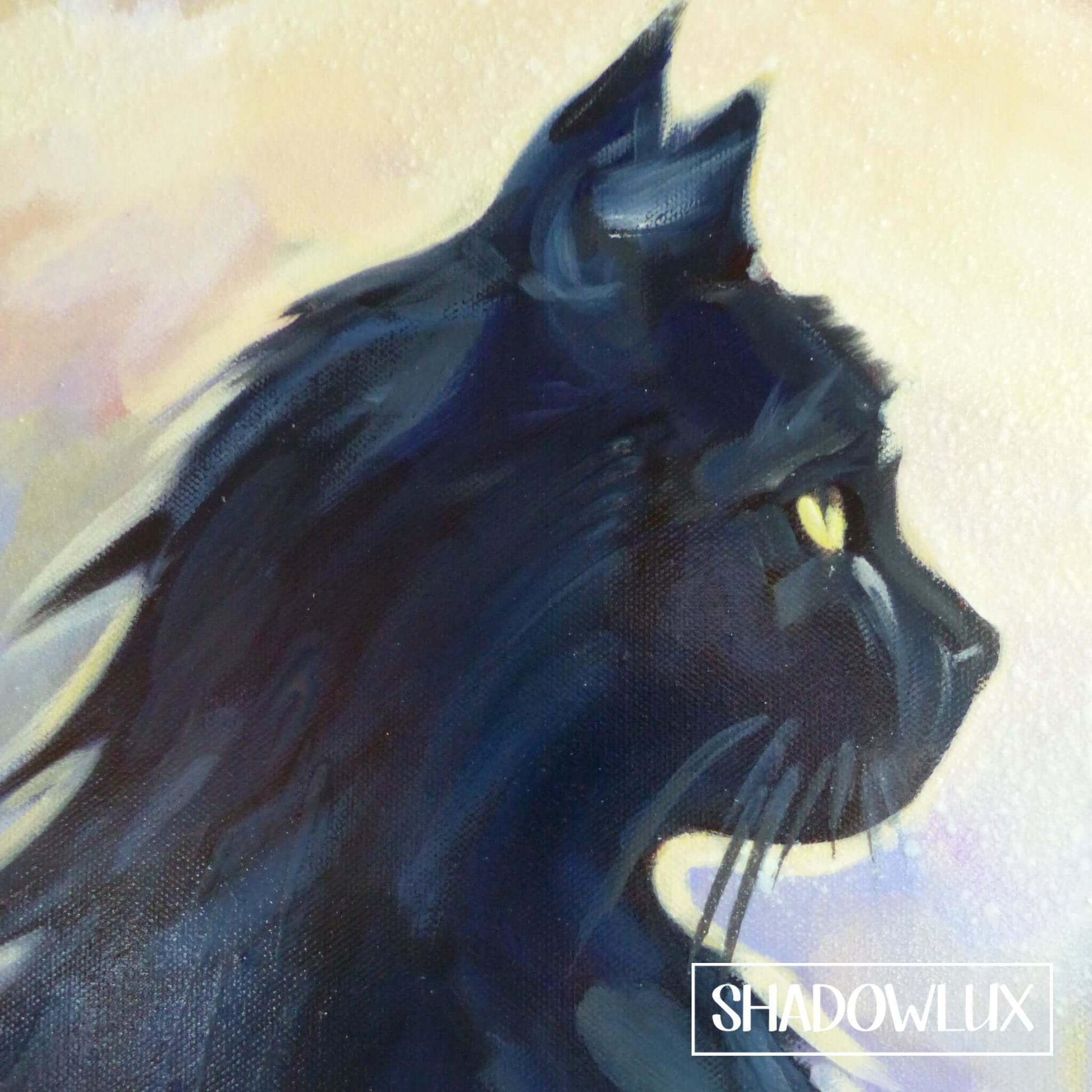 close up of glow in the dark black cat painting during the day