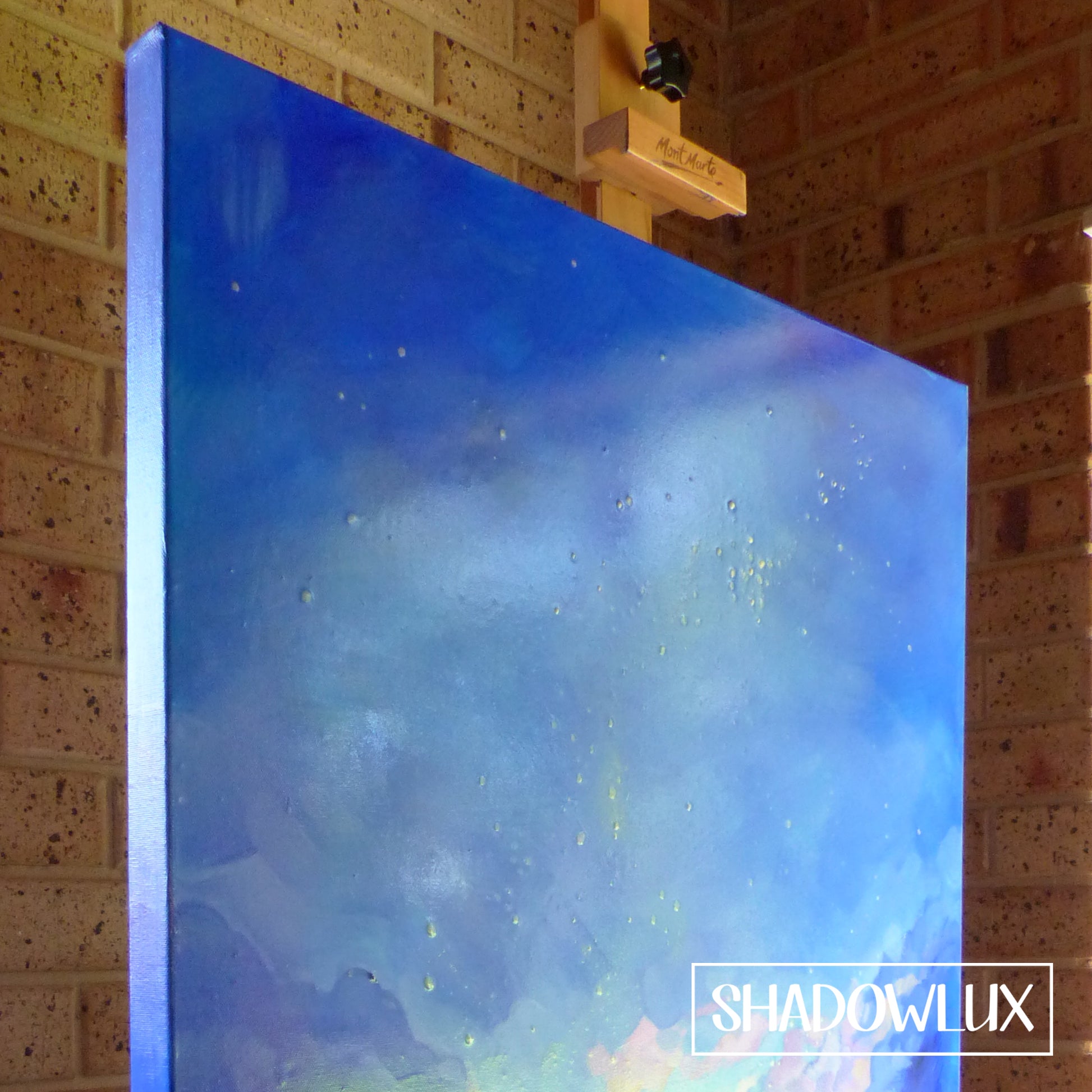 glow in the dark blue sky painting closeup during the day