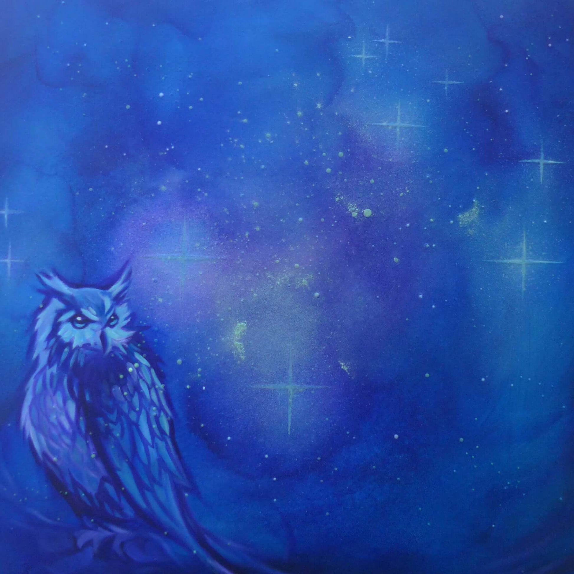glow in the dark Owl against a starry night sky with blue and purple hues