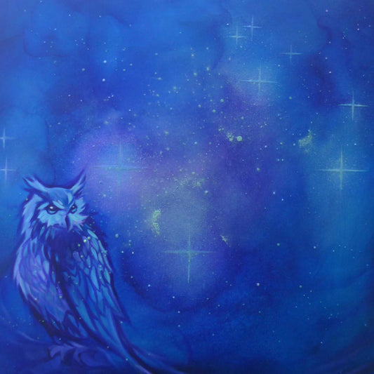 glow in the dark Owl against a starry night sky with blue and purple hues