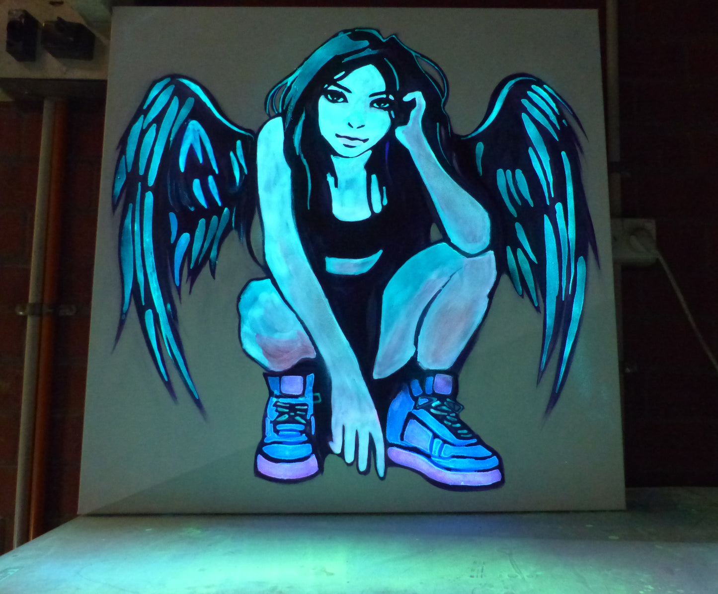 Glowing artwork of a angel with wings on a dark background