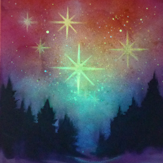 glow in the dark starry night sky with silhouettes of trees