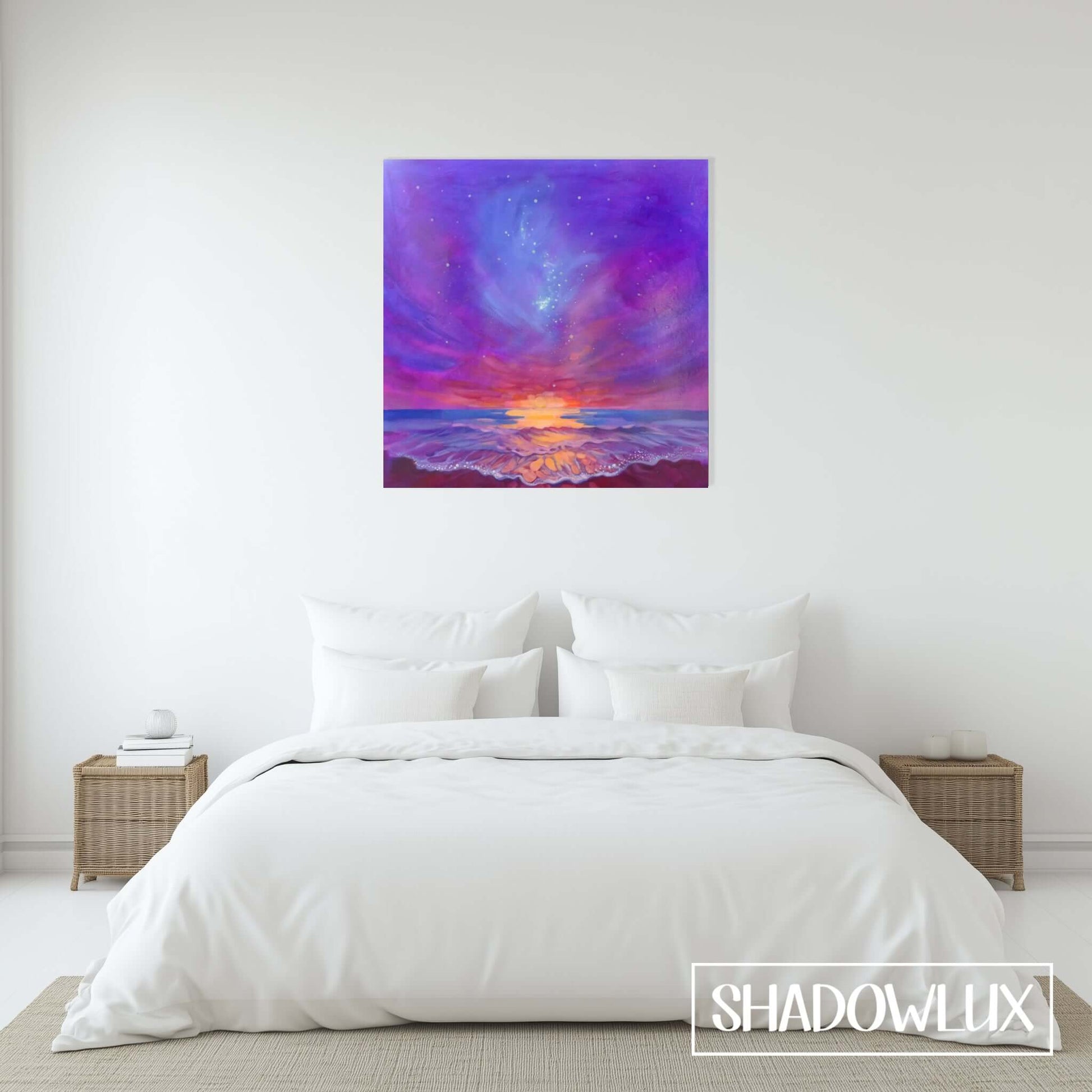 sunset painting that glows in the dark,  on the wall during the day in a bedroom.