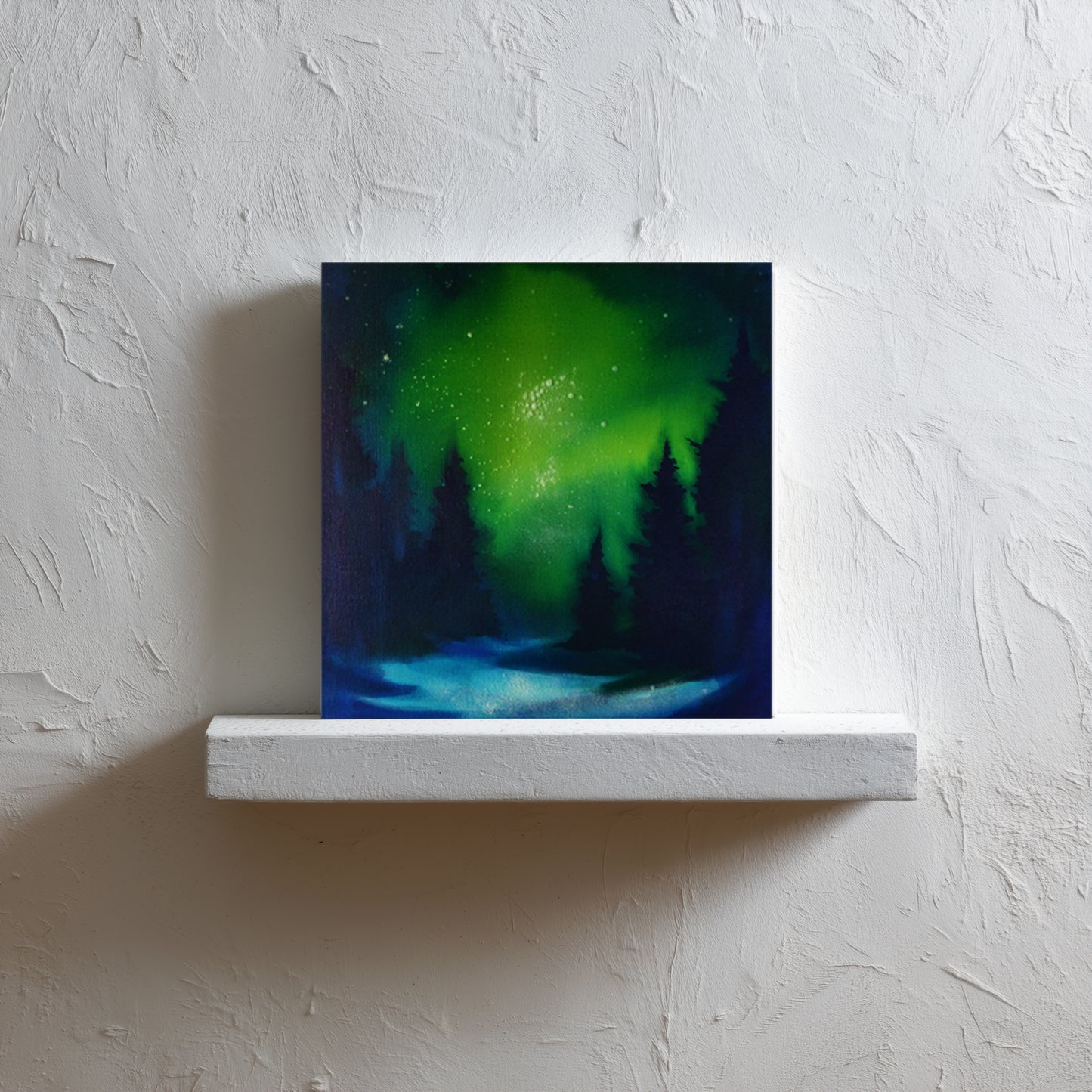 glow in the dark artwork of a green and blue sky with trees on a white wall.