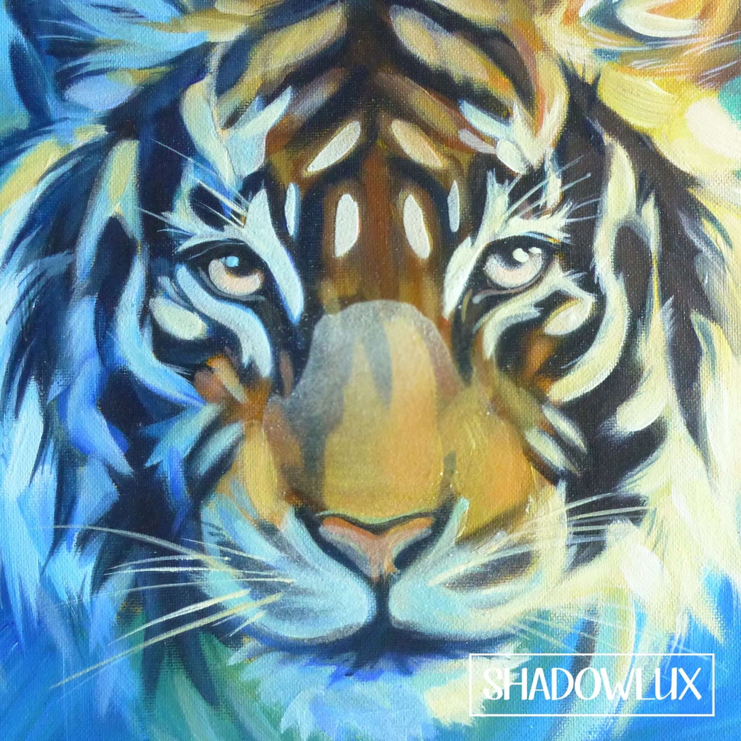 Daytime painting of a tiger’s face that glows softly in the dark