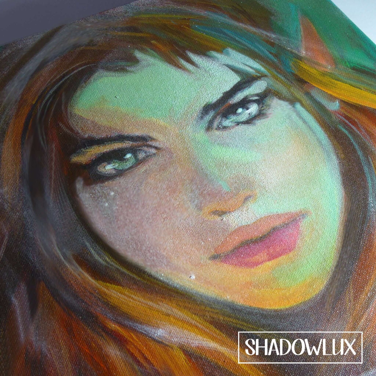 Portrait of Ember Light, the red-haired elf glowing with green magic in the dark