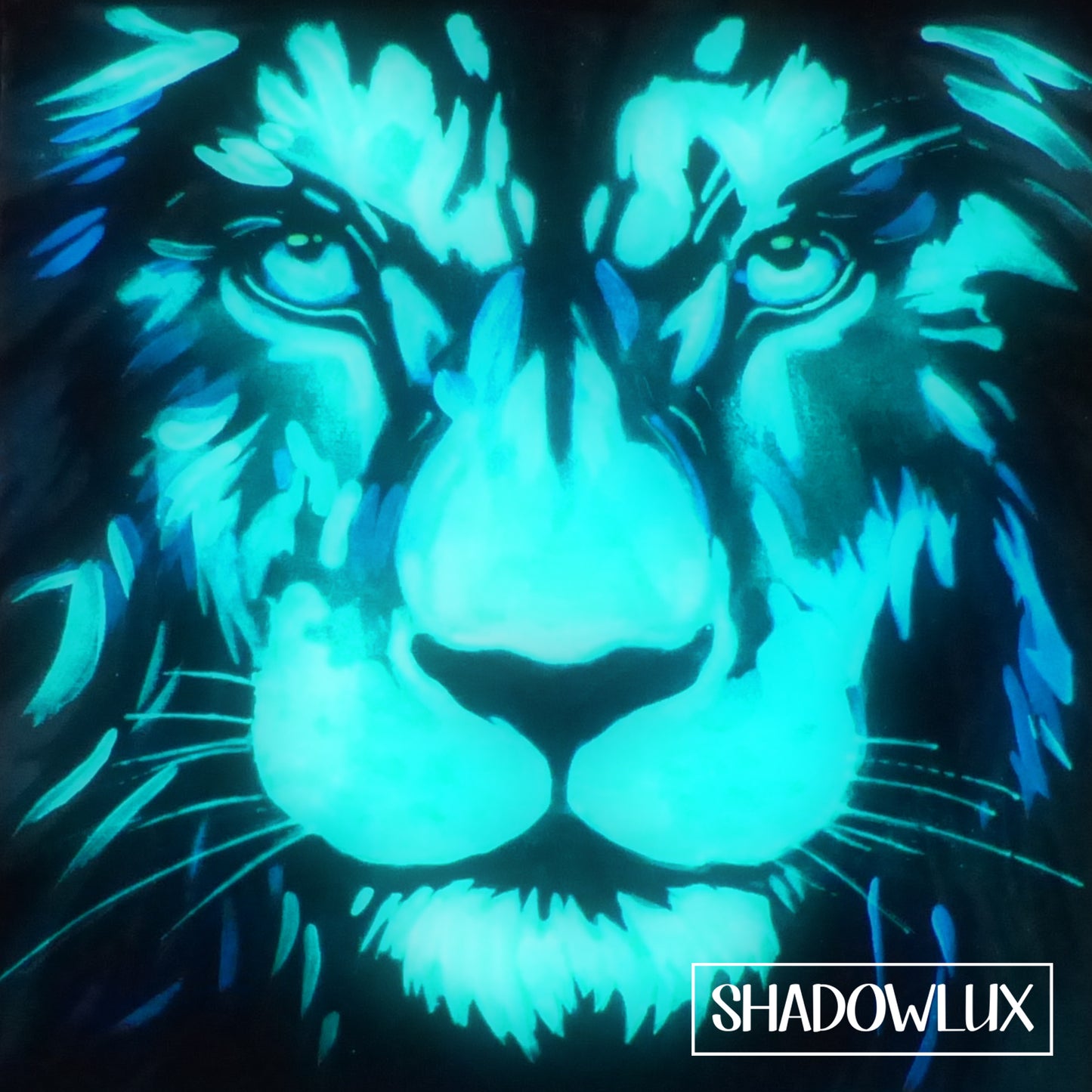 hand painted glow in the dark lion painting of blue and aquas