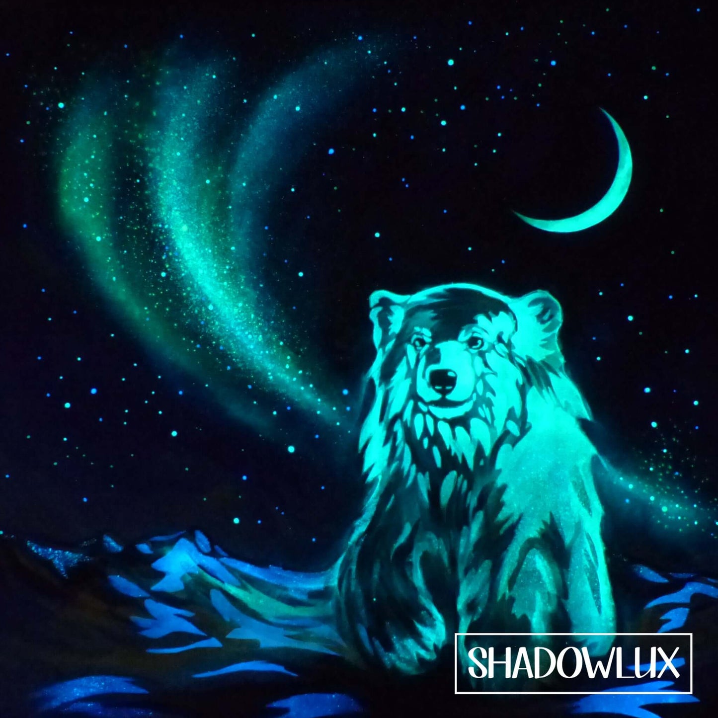 Glow painting of a snow bear standing in snow beneath a crescent moon and northern lights aurora