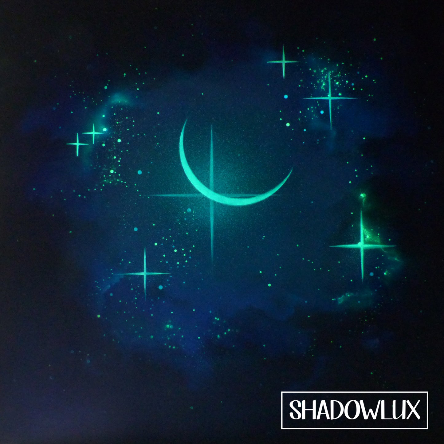 glow in the dark crescent moon painting in aqua and greens