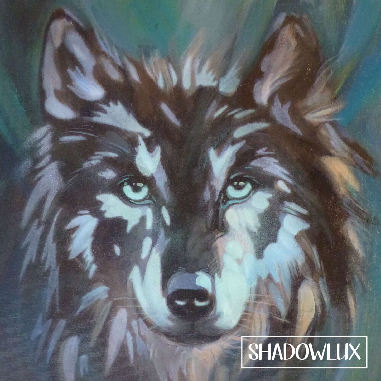 glow in the dark painting of a wolf’s intense gaze with natural colors