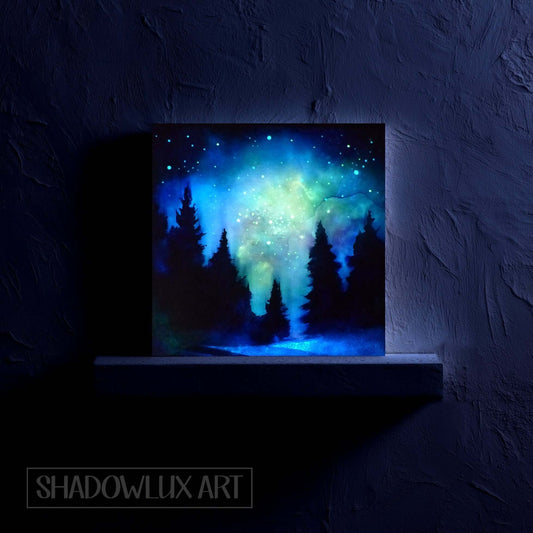 best glow in the dark paintings I've made so far, trees and a little galaxy of stars