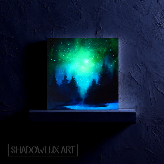 glow in the dark forest artwork on a textured dark wall.