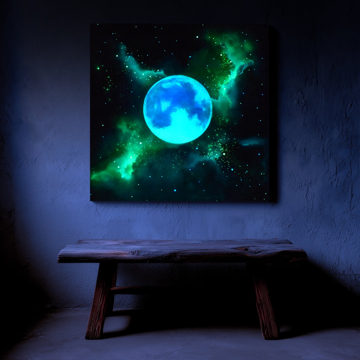 green and blue glow moon artwork on a dark wall with a wooden bench below.
