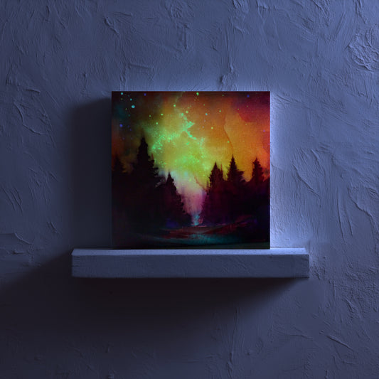 glow in the dark nebula artwork of a colorful forest scene with a vibrant sky on a textured wall.