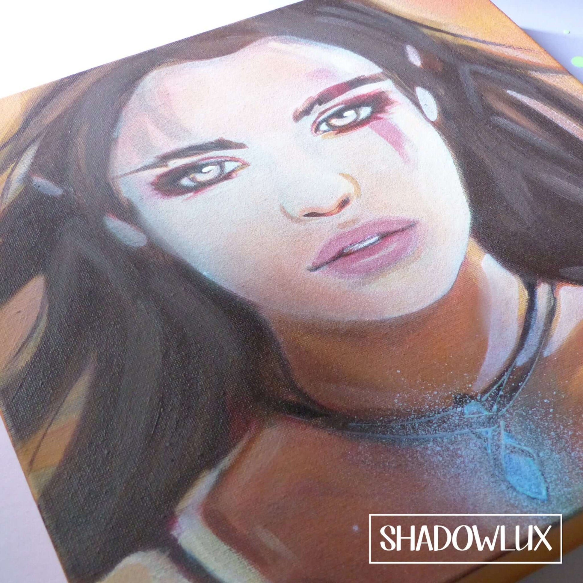 Fantasy art of a glowing elf girl wearing a magical blue pendant