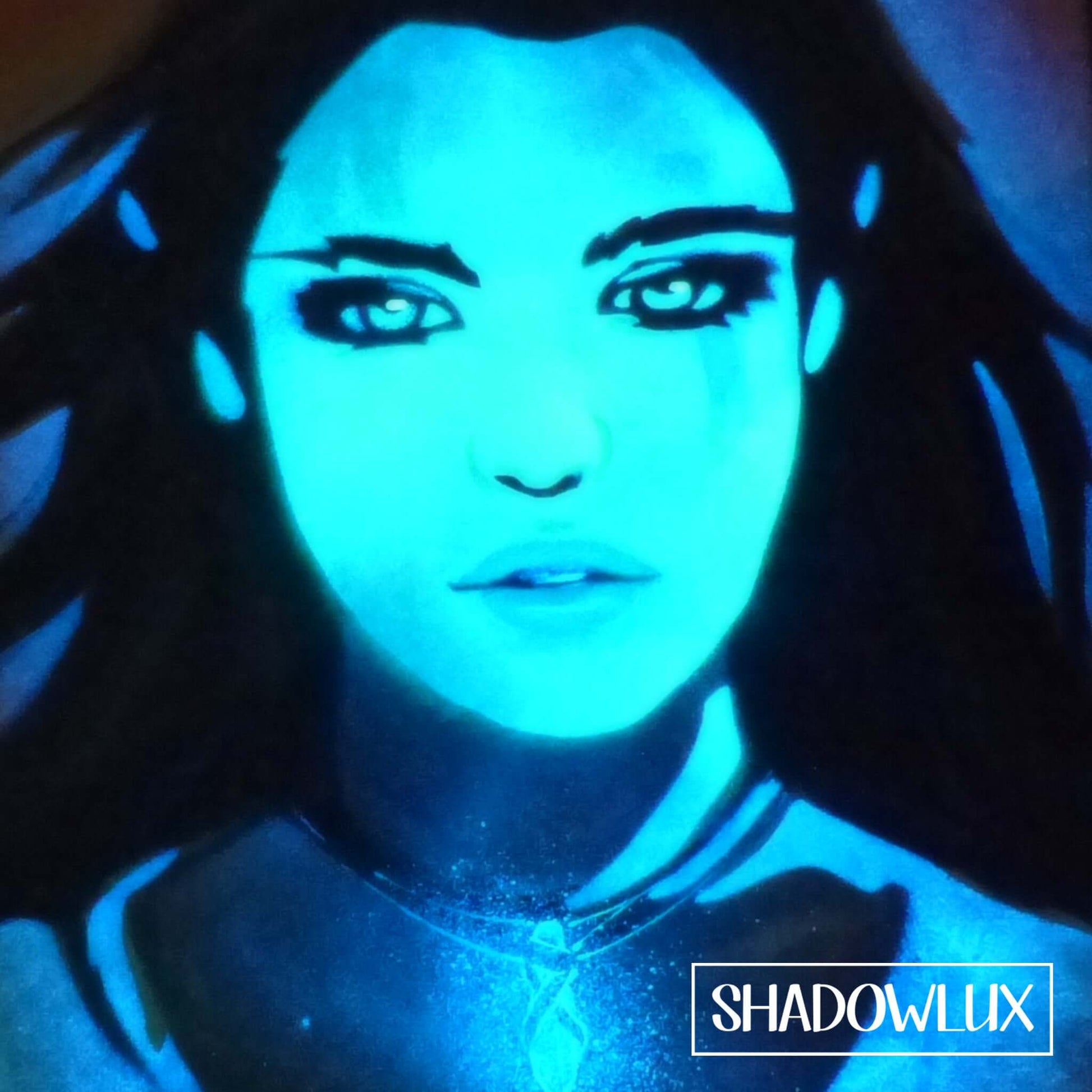 Artwork of a powerful elf girl with a blue glowing pendant casting light