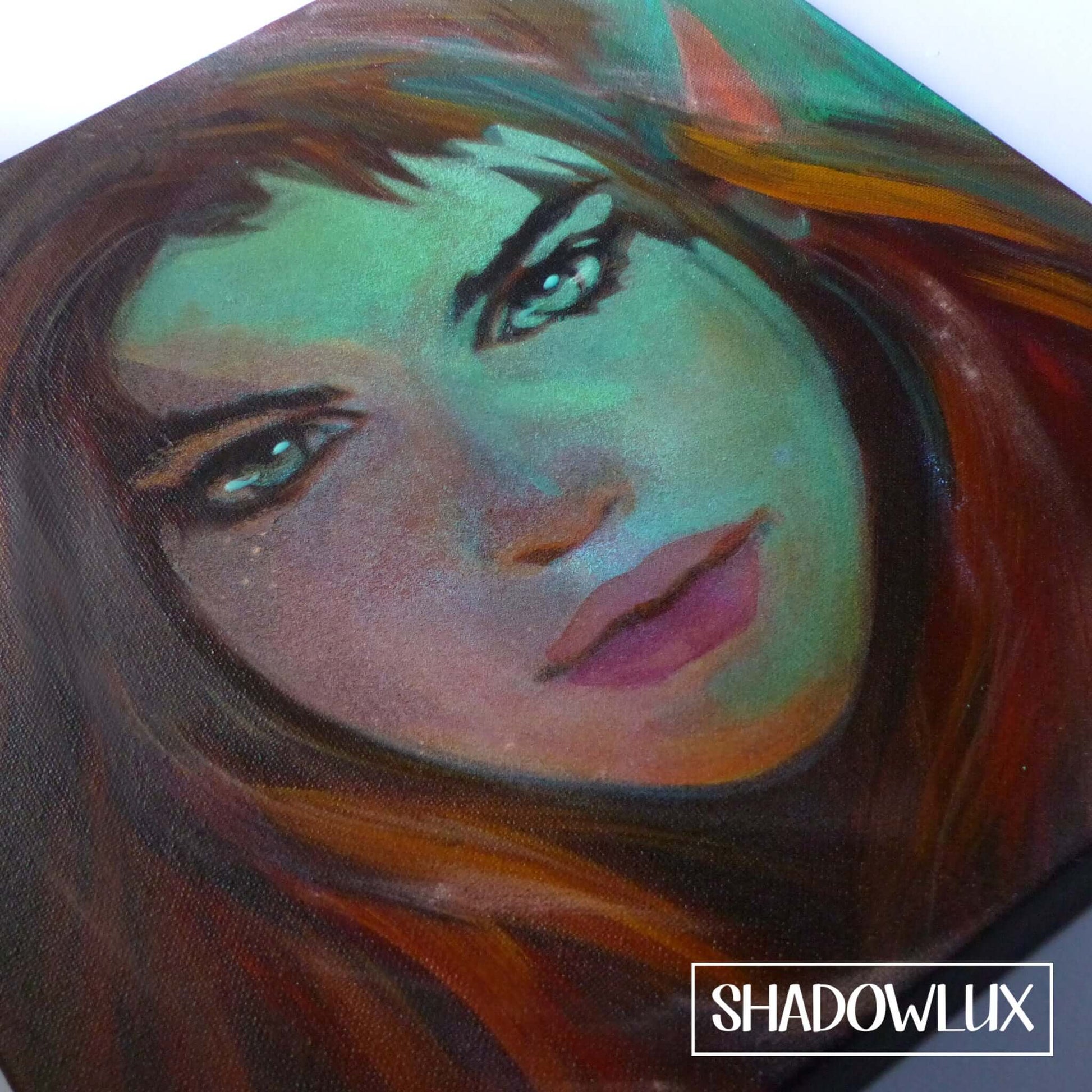 Enchanted glow painting of a red-haired elven girl called Ember Light 